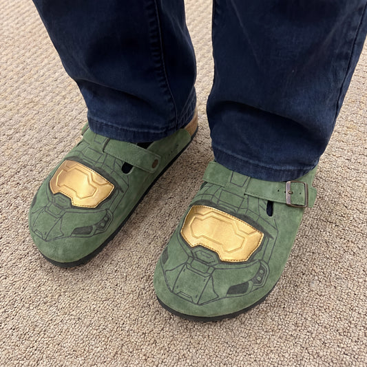 Master Chief clogs worn with jeans on carpet