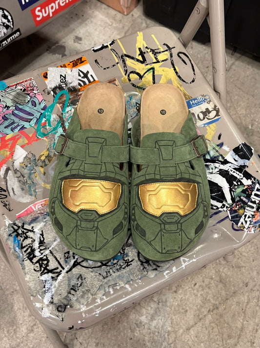 Master Chief clogs on graffiti chair
