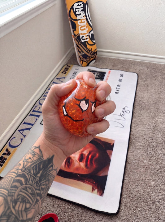 Meatwad stress ball being squeezed and squished